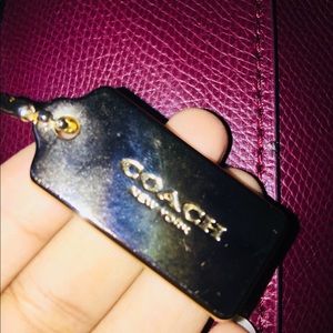 Original burgundy Coach tote .